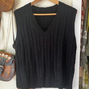 Black sweater vest
